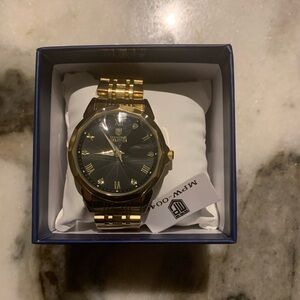 Invicta Gold and Black Timepiece
